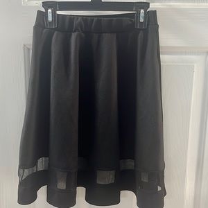 Black Skirt with a Mesh Design